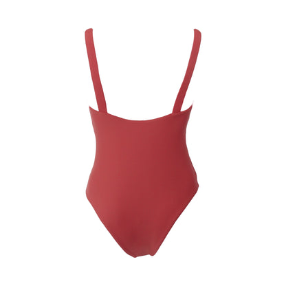 Back view of terracotta straight square neck one piece swimsuit with adjustable gold belt buckle shoulder straps, high cut legs and cheeky bum coverage. 